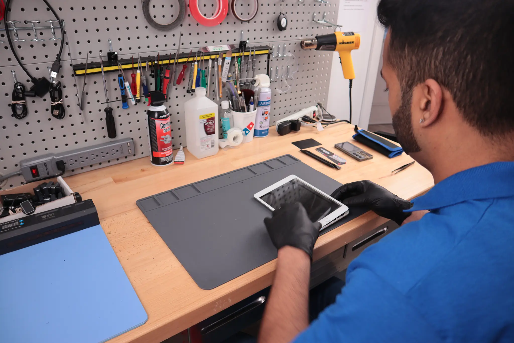 Expert Technician Fixing A Tablet At Ifixscreens