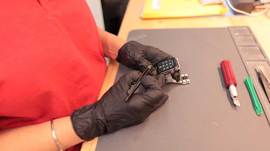 Experts Repairing A Smartwatch
